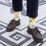 Chaussettes Astérix Comics jaune portées homme