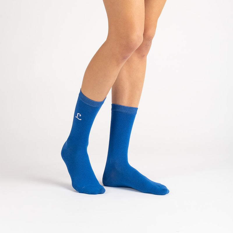 Chaussettes recyclées portées studio femme