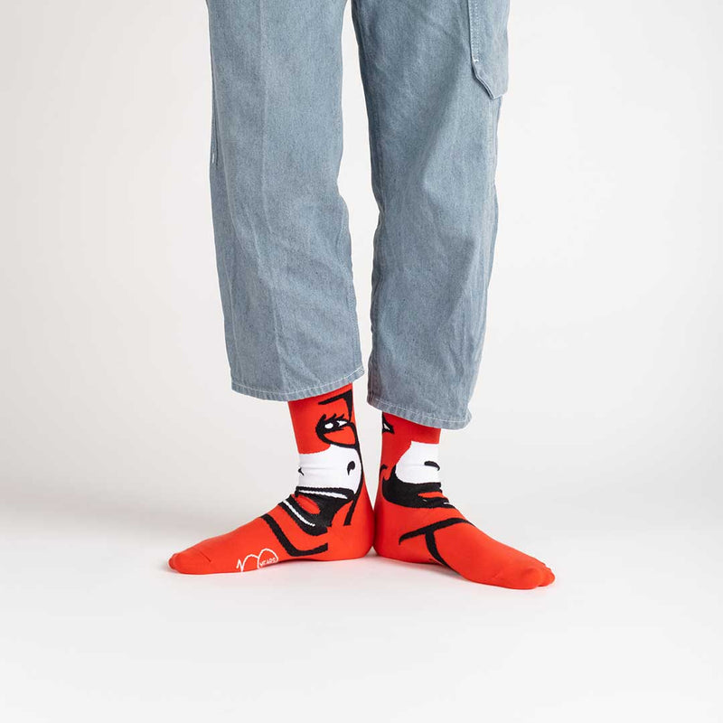 Chaussettes La Vache qui rit 100 ans rouge portées homme